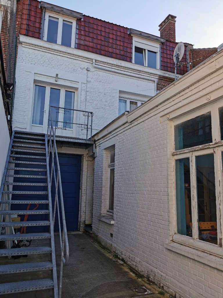 Immeuble hyper centre  usage mixte Photo 1 - Brique Rouge Immobilier