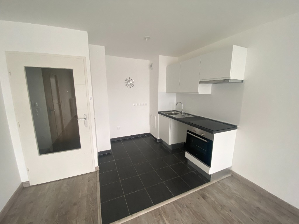 Capinghem appartement place de parking exterieur Photo 3 - Brique Rouge Immobilier Capinghem appartement place de parking exterieur Photo 3 - Brique Rouge Immobilier