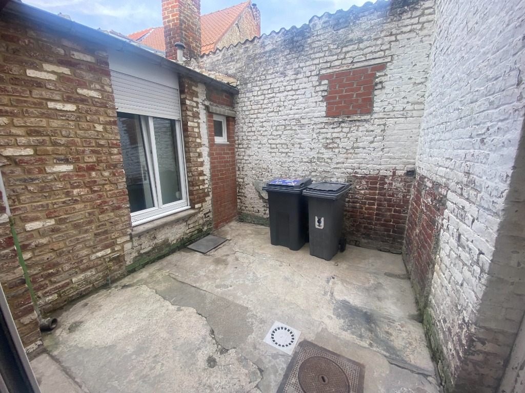 Exclusivite sainghin en weppes maison 2 chambres cours Photo 5 - Brique Rouge Immobilier Exclusivite sainghin en weppes maison 2 chambres cours Photo 5 - Brique Rouge Immobilier