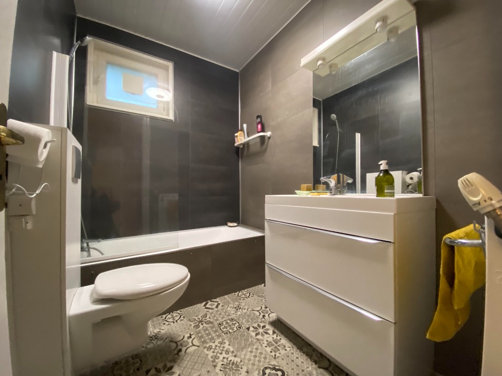 Semi plain pied individuel 3 chambres  garage carport jardin Photo 3 - Brique Rouge Immobilier