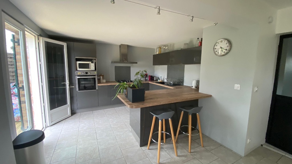 Belle maison de lotissement semi individuelle garage Photo 1 - Brique Rouge Immobilier