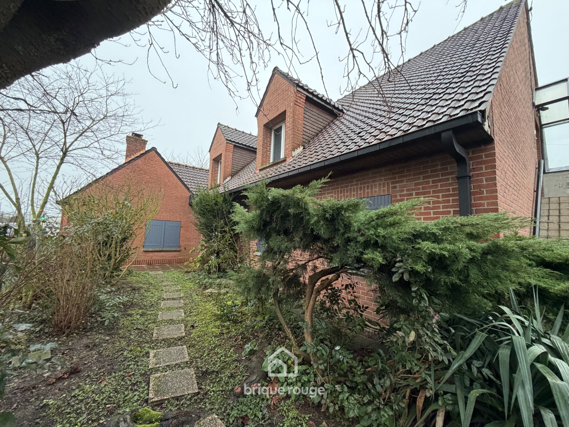 Maison individuelle de 1985 en semi plain pied Photo 1 - Brique Rouge Immobilier