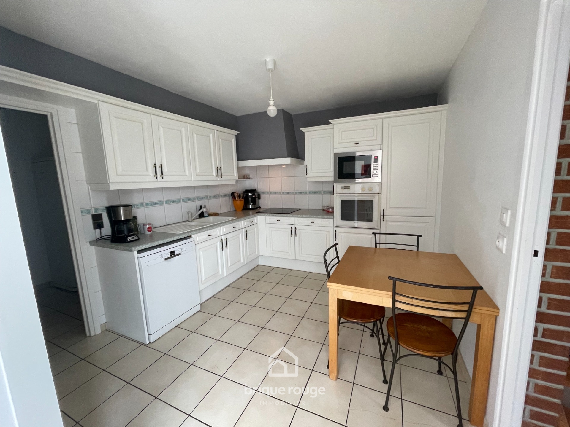 Maison individuelle de 1985 en semi plain pied Photo 4 - Brique Rouge Immobilier