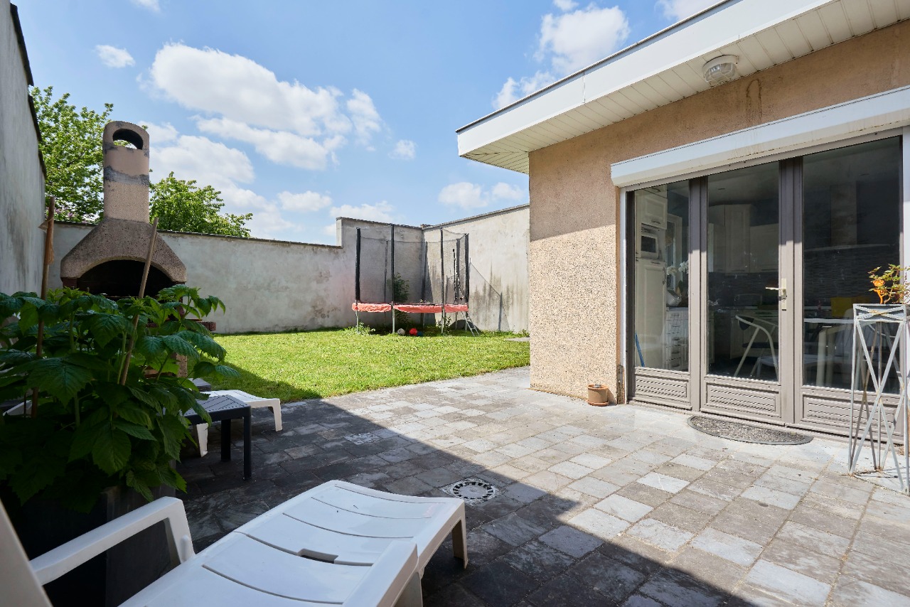 Maison semi individuelle avec jardin et garage Photo 2 - Brique Rouge Immobilier