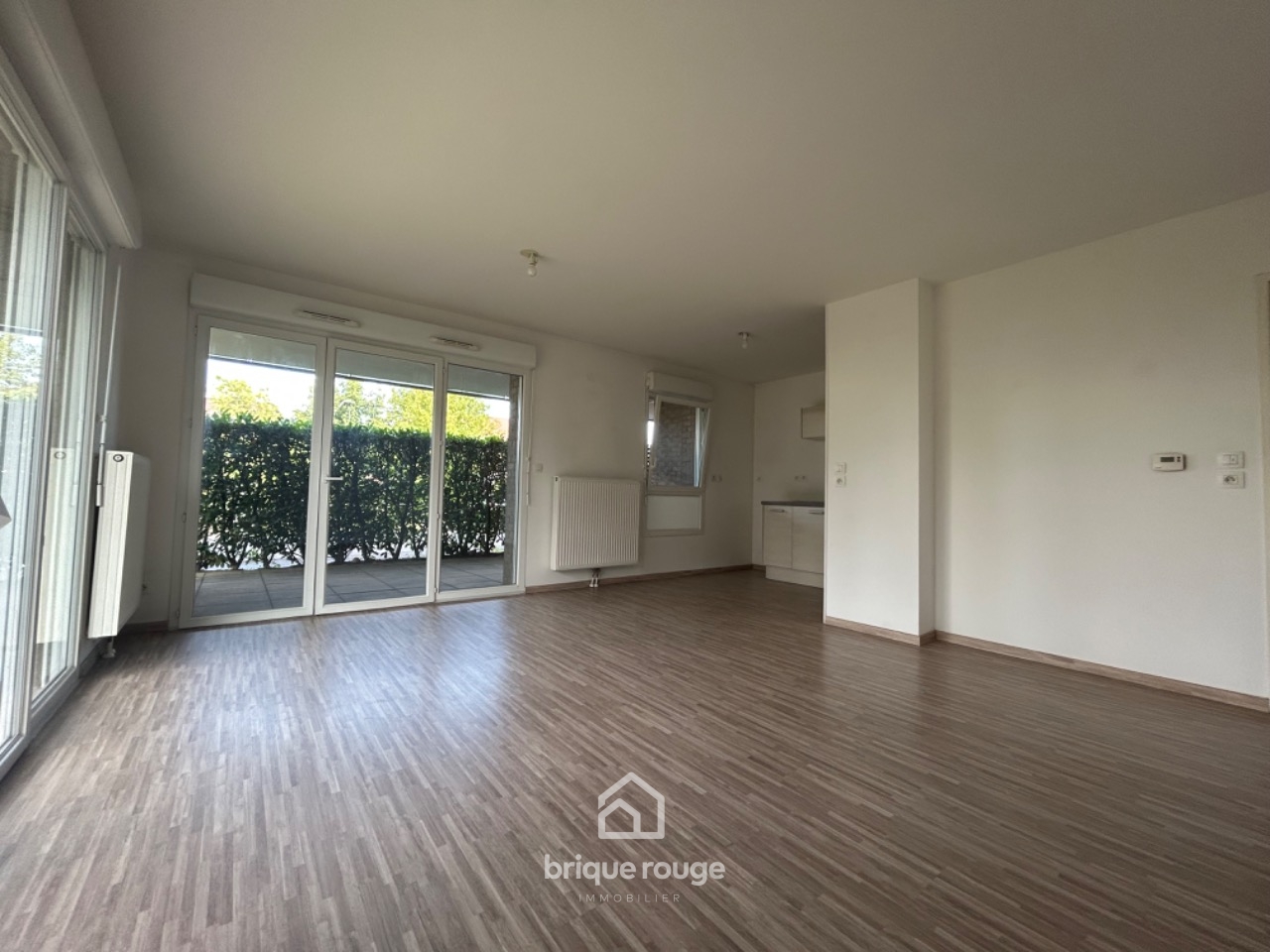 Vaste type3 pmr en rdc avec jardin   terrasse  2 parking Photo 4 - Brique Rouge Immobilier