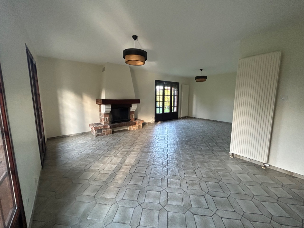 Plain pied individuel 3 chambres jardin garage parking Photo 2 - Brique Rouge Immobilier