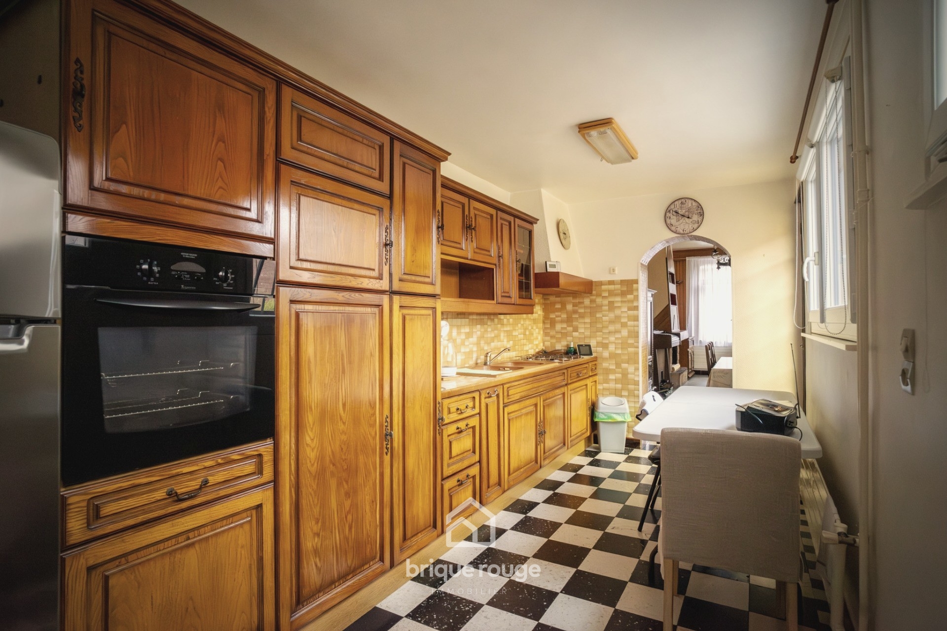 Semi mitoyenne avec beaucoup de potentiel  Photo 4 - Brique Rouge Immobilier