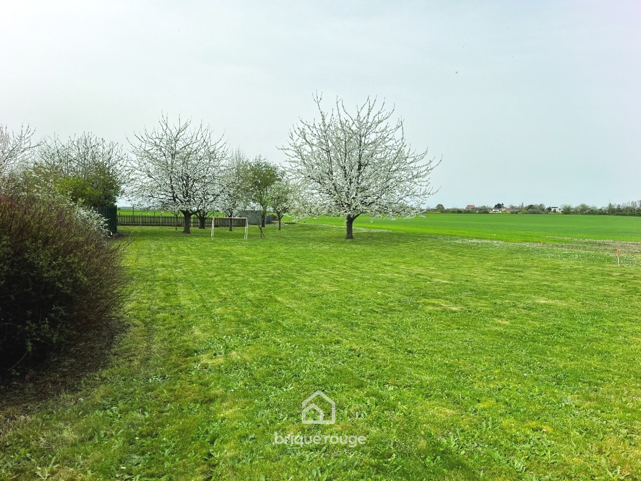 Moncheaux terrain en second rang vue campagne 1283m  Photo 2 - Brique Rouge Immobilier