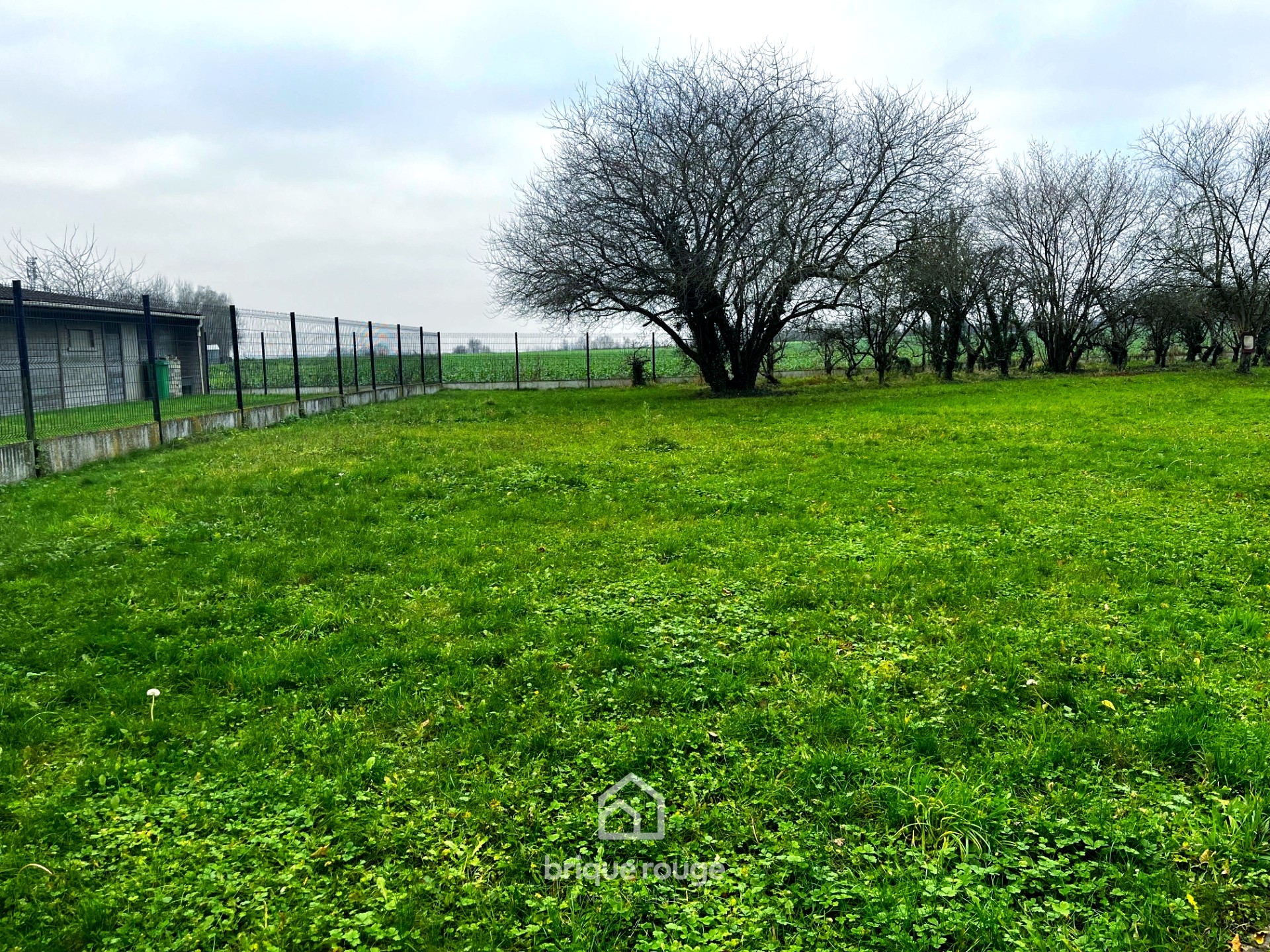 Terrain viabilise moncheaux d environ 616 m Photo 1 - Brique Rouge Immobilier