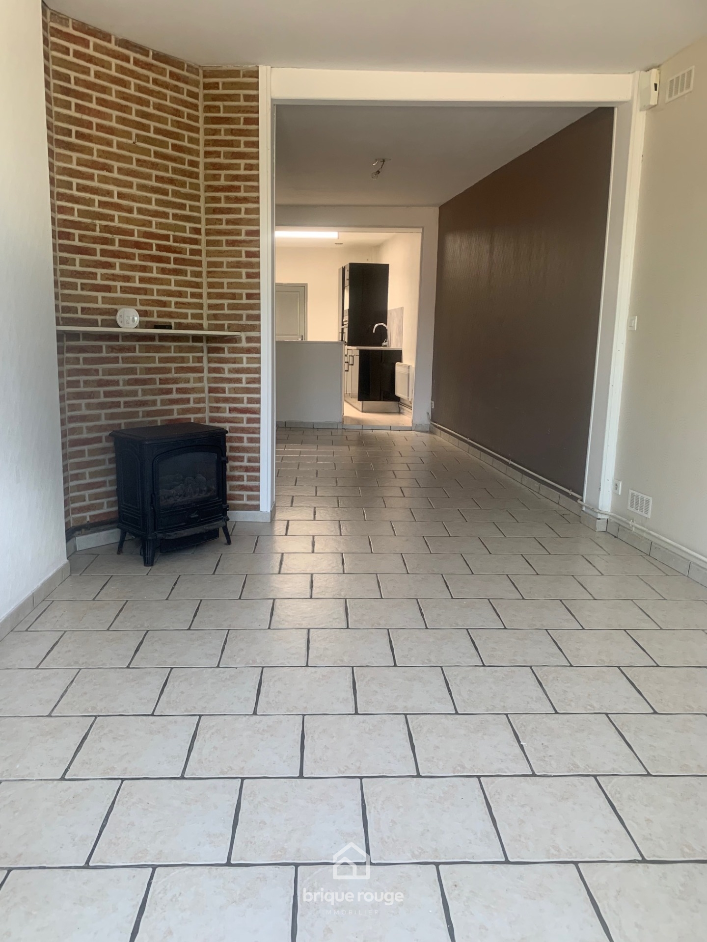 Maison semi individuelle renovee Photo 1 - Brique Rouge Immobilier