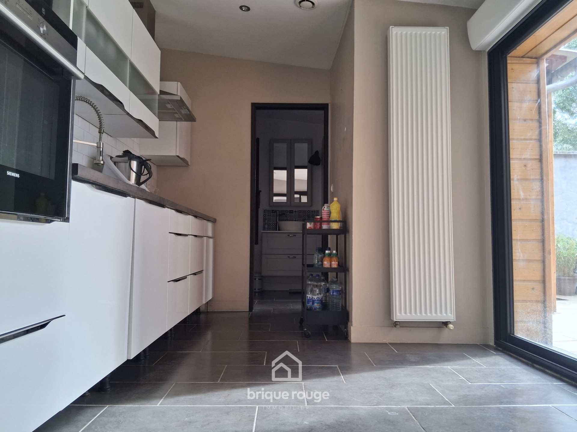 Maison 1930 renovee 3 chambres exterieur aere Photo 4 - Brique Rouge Immobilier