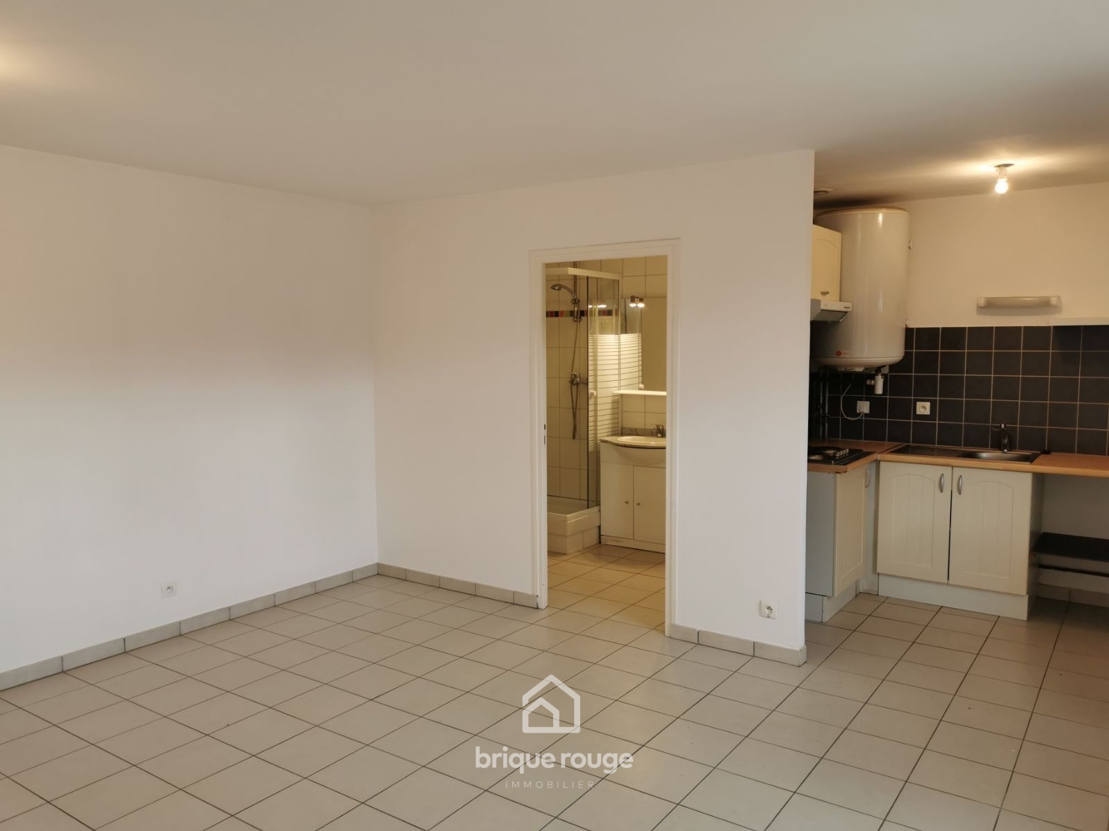 Immeuble 126m avec 4 appartements Photo 1 - Brique Rouge Immobilier Immeuble 126m avec 4 appartements Photo 1 - Brique Rouge Immobilier