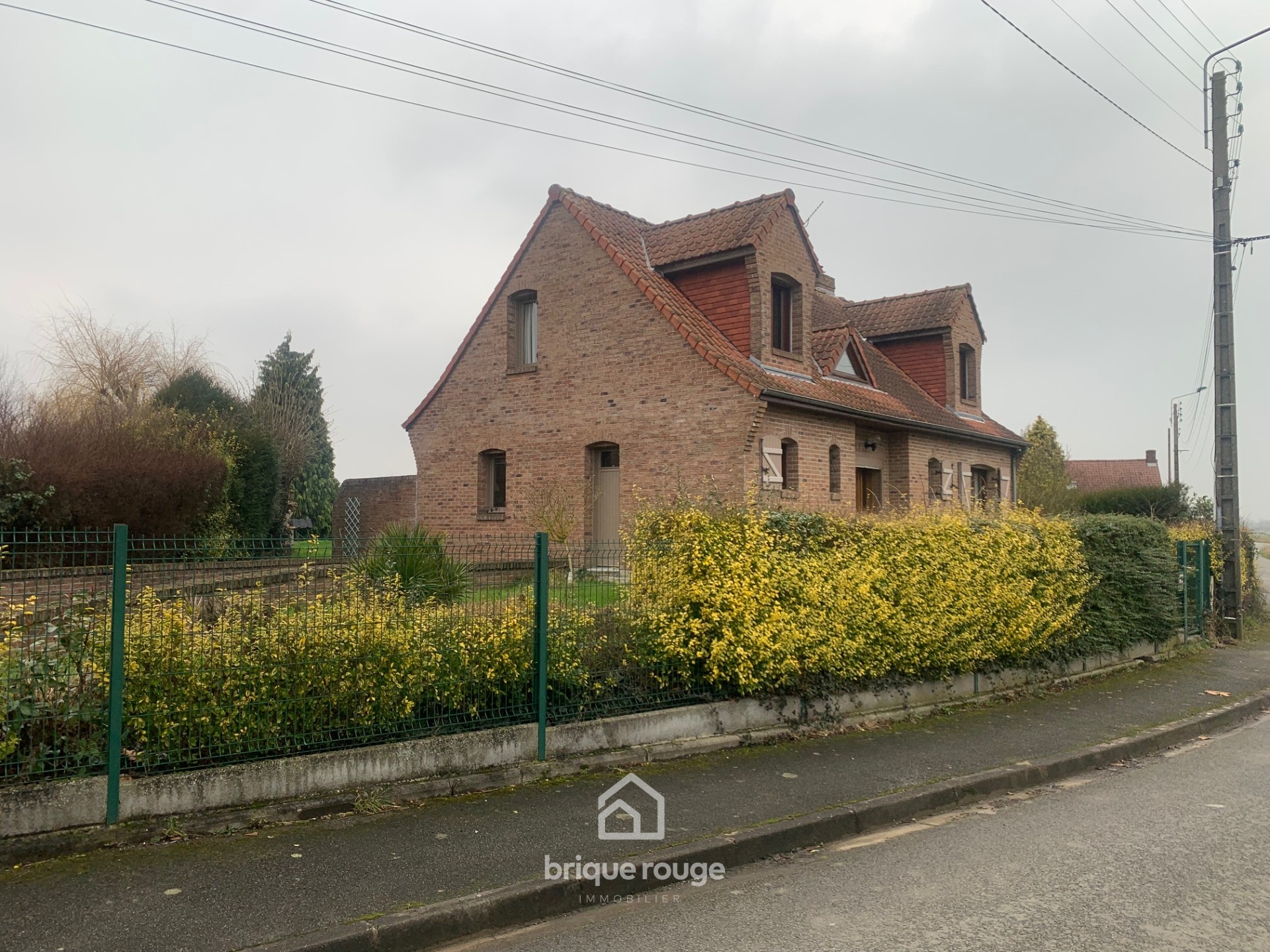 Pavillon individuel semi plain pied dans les weppes Photo 1 - Brique Rouge Immobilier