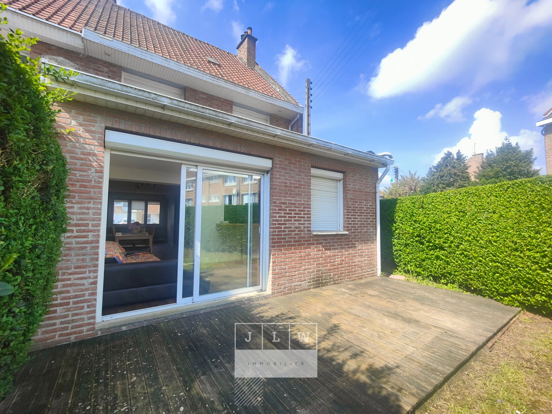 Hallennes belle semi individuelle t5  cave jardin   parkings Photo 1 - Brique Rouge Immobilier