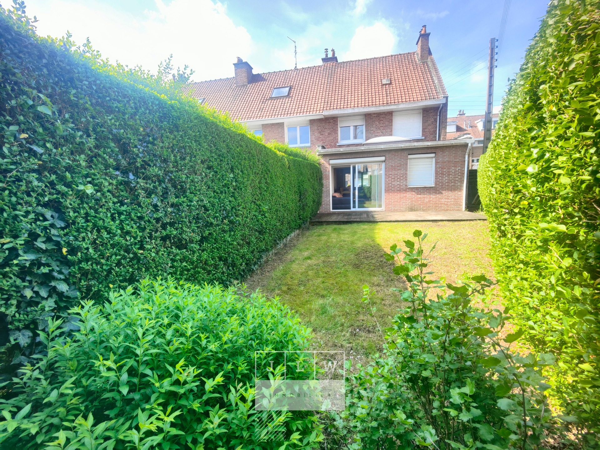 Hallennes belle semi individuelle t5  cave jardin   parkings Photo 2 - Brique Rouge Immobilier