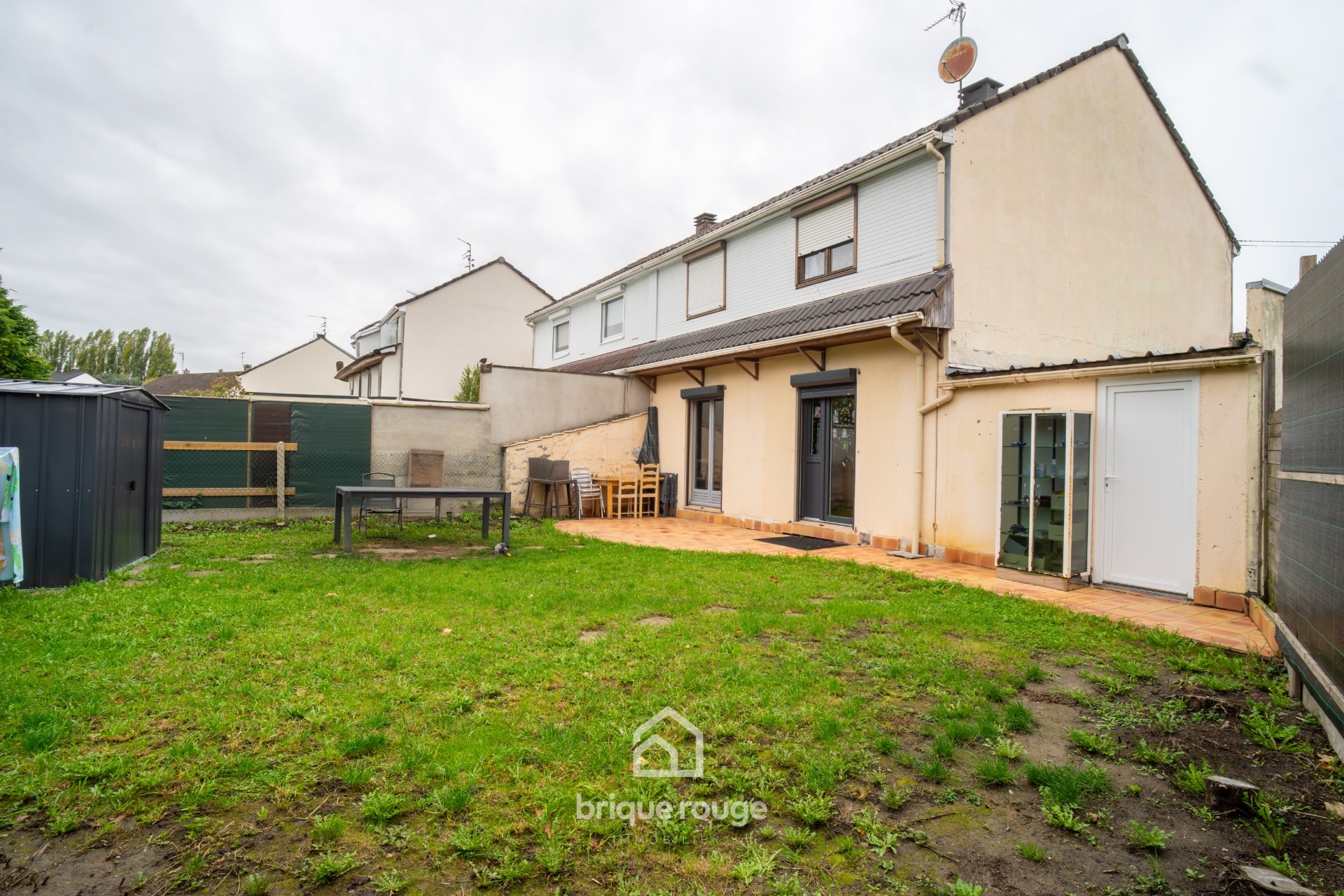 Maison semi individuelle avec garage Photo 1 - Brique Rouge Immobilier