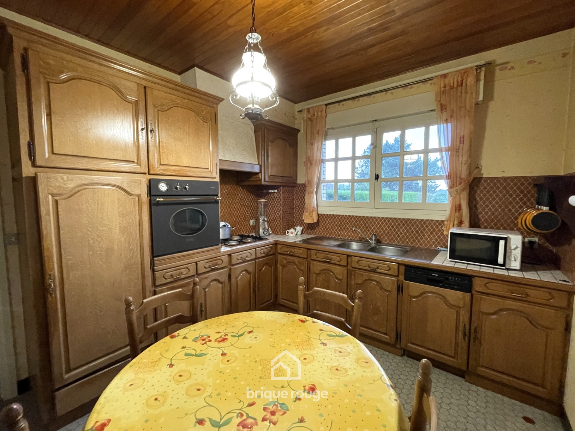 Maison semi plain pied 4 chambres et sous sol Photo 5 - Brique Rouge Immobilier