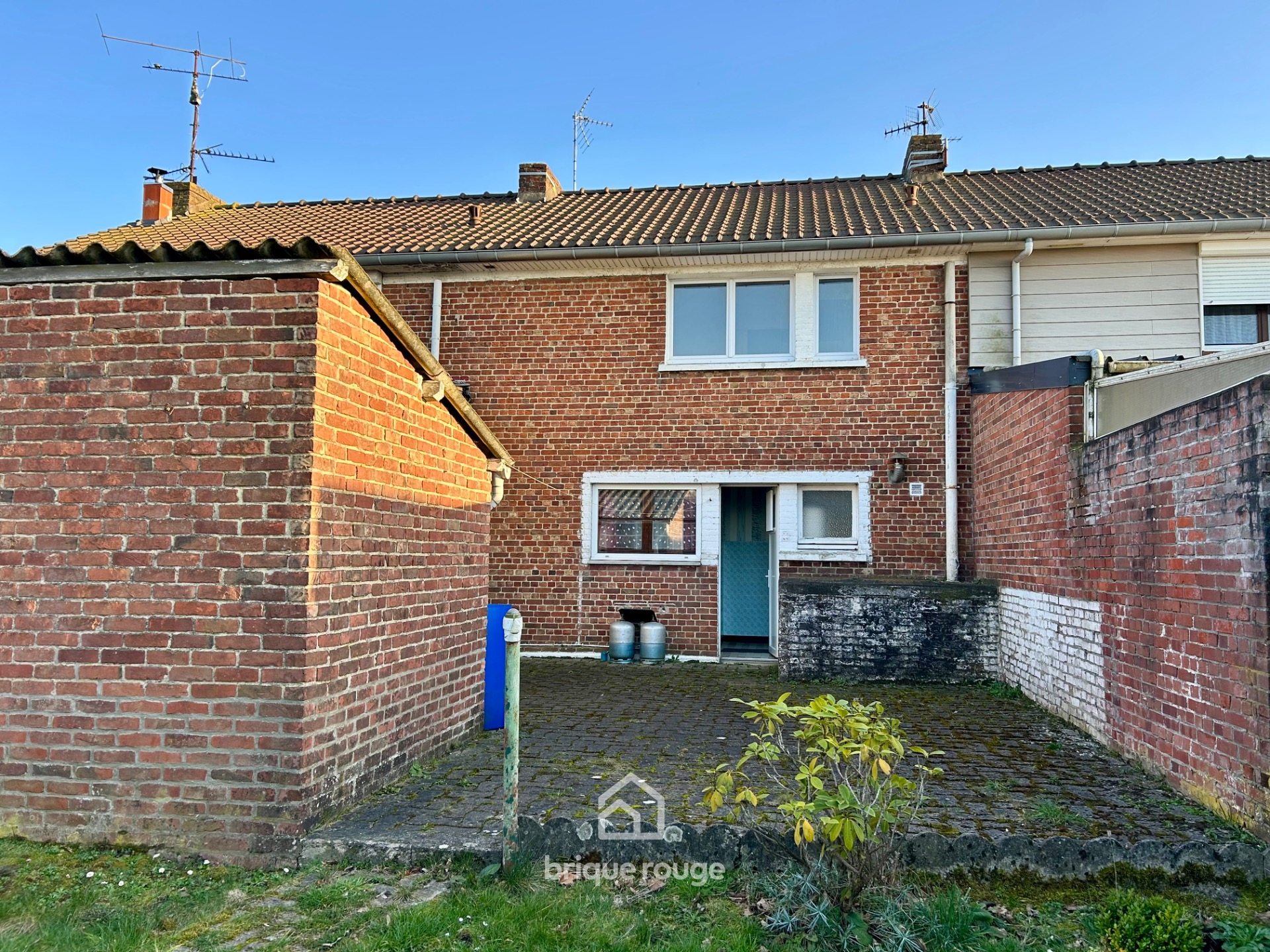 Maison 3 chambres jardin garage Photo 1 - Brique Rouge Immobilier