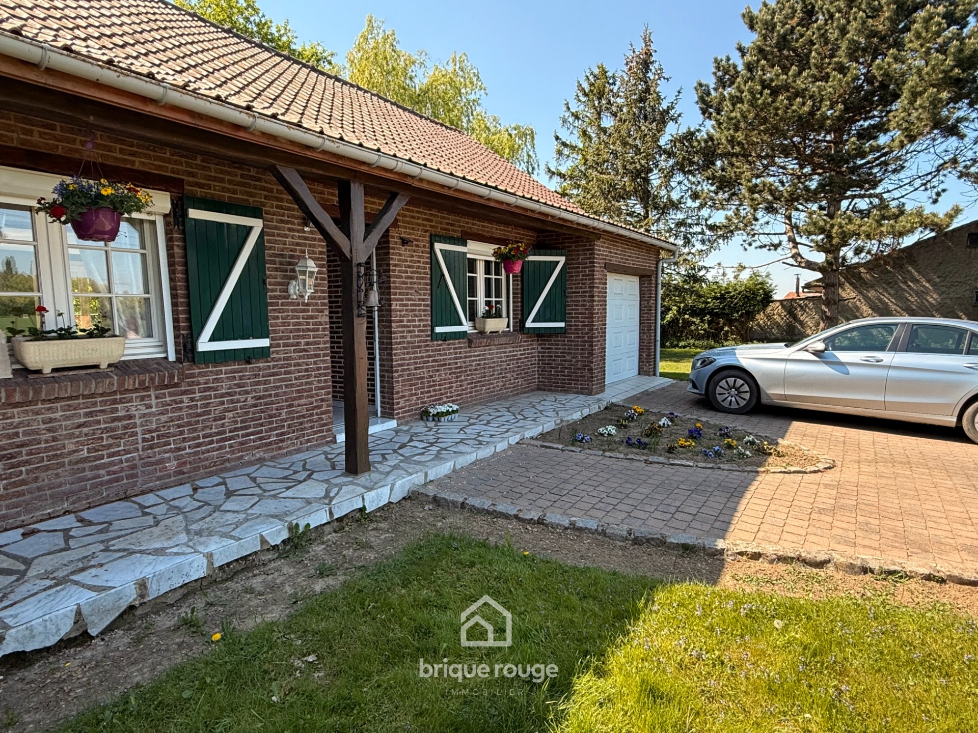 Maison individuelle avec hangar sur une parcelle de 7500 m Photo 1 - Brique Rouge Immobilier