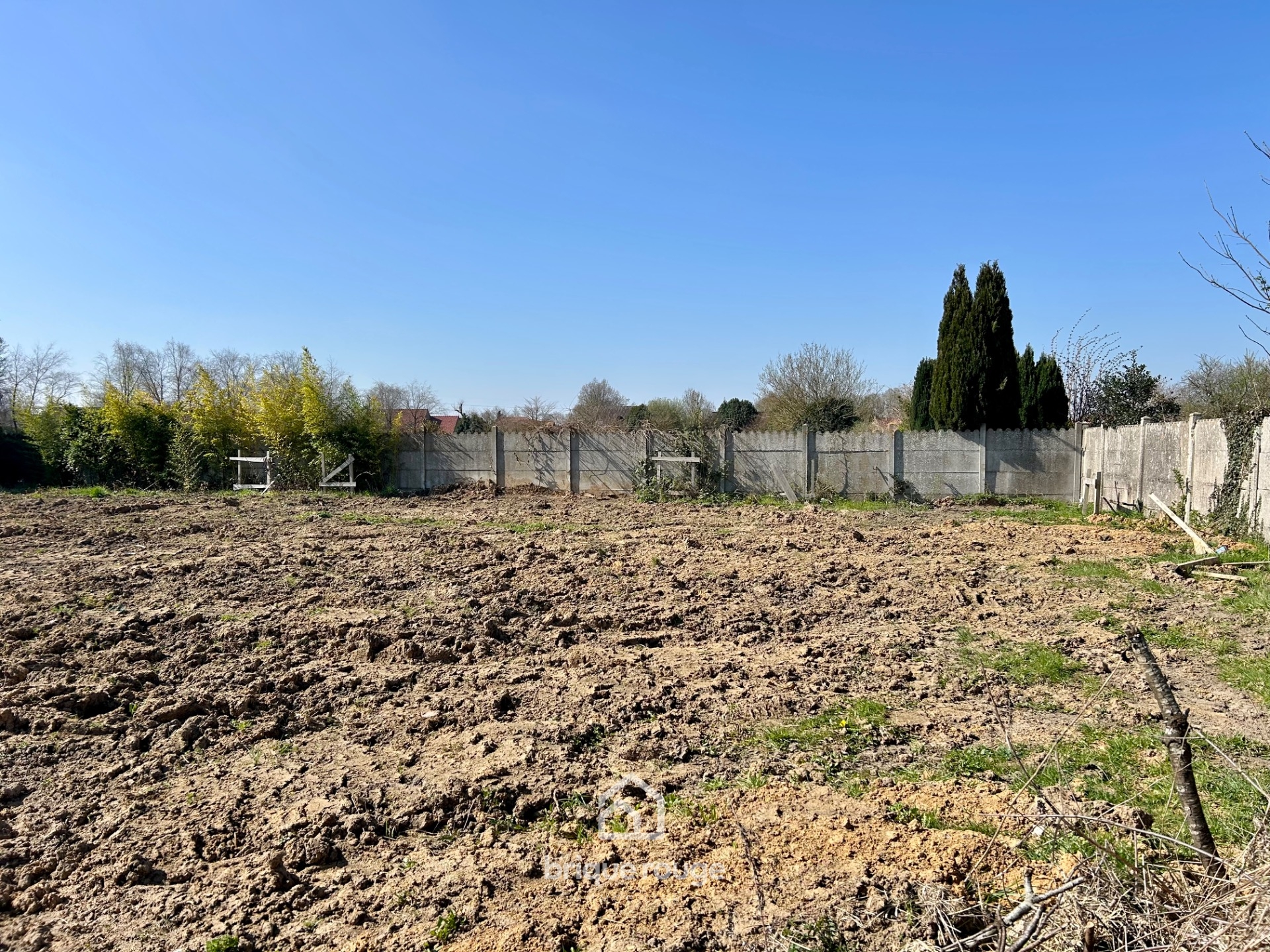 Terrain constructible de 814 m centre ville de santes Photo 1 - Brique Rouge Immobilier