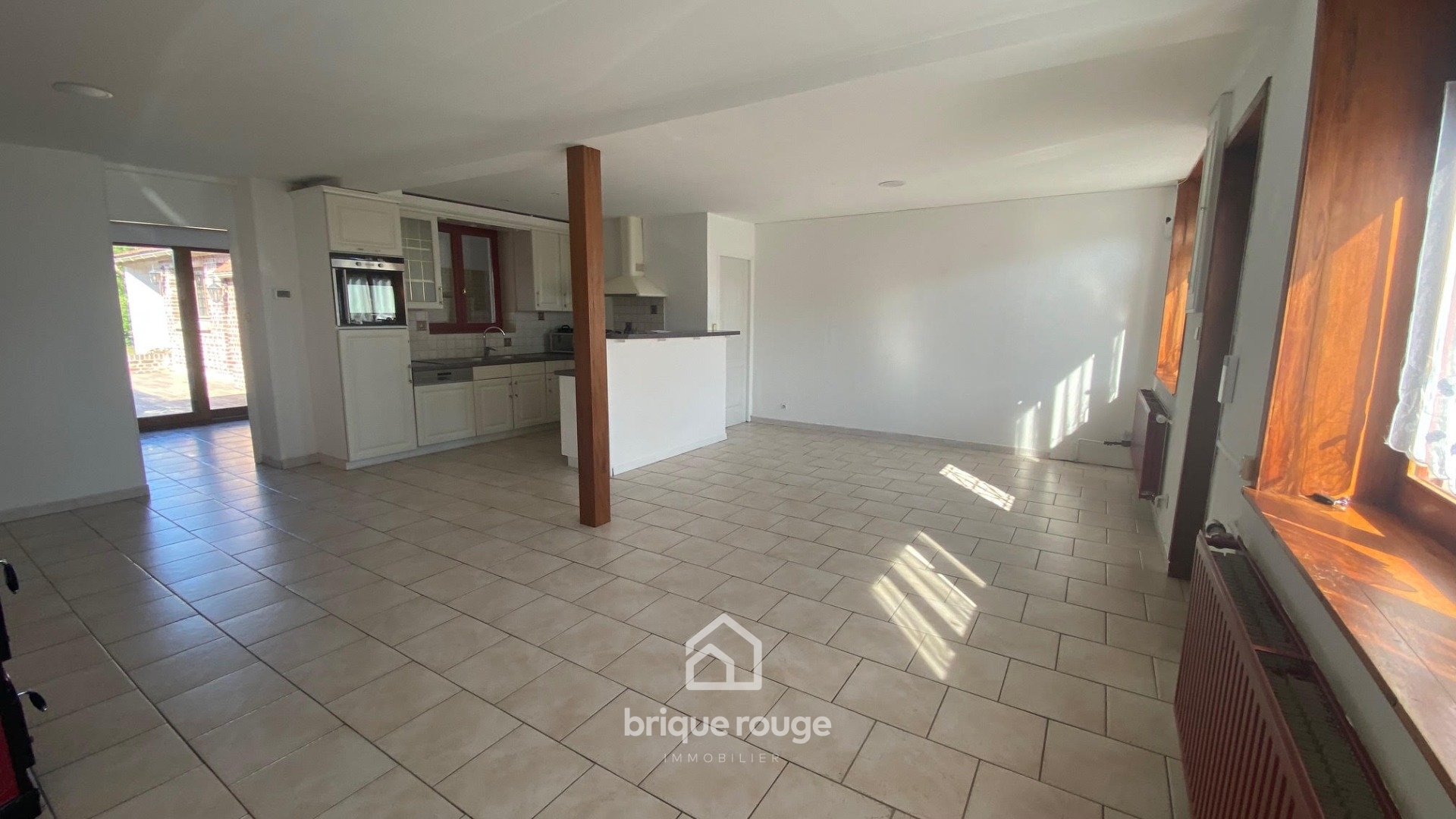 En exclusivite maison renovee 3 chambres jardin parking Photo 2 - Brique Rouge Immobilier