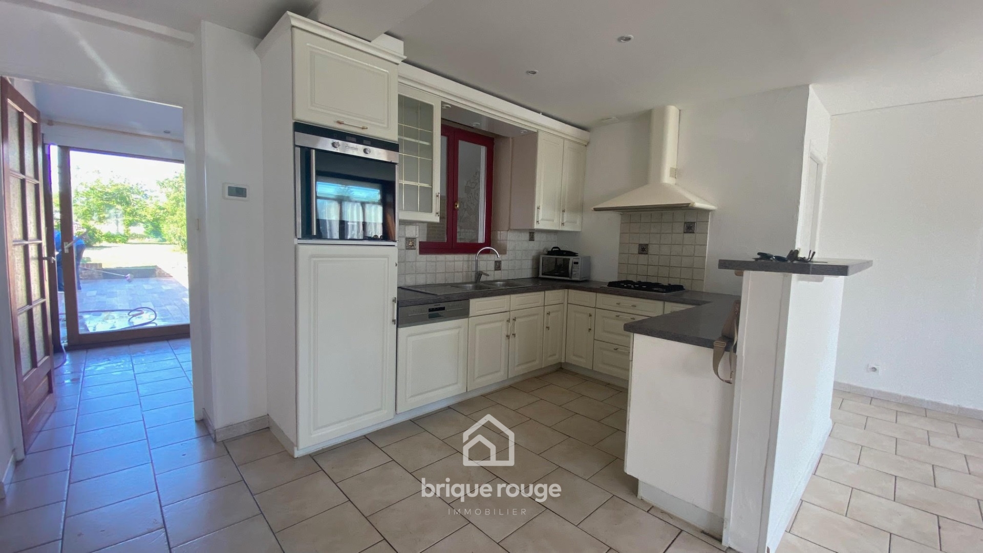 En exclusivite maison renovee 3 chambres jardin parking Photo 3 - Brique Rouge Immobilier