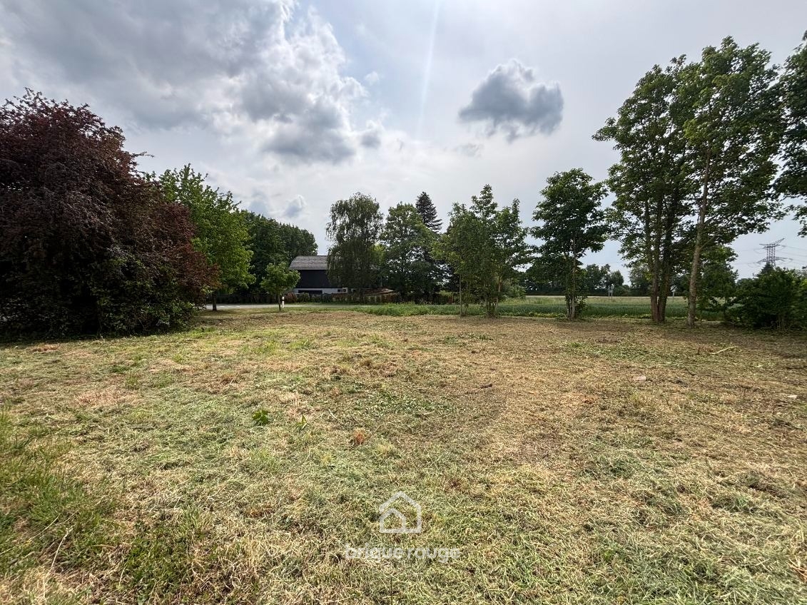 Terrain constructible de 700m Photo 2 - Brique Rouge Immobilier Terrain constructible de 700m Photo 2 - Brique Rouge Immobilier