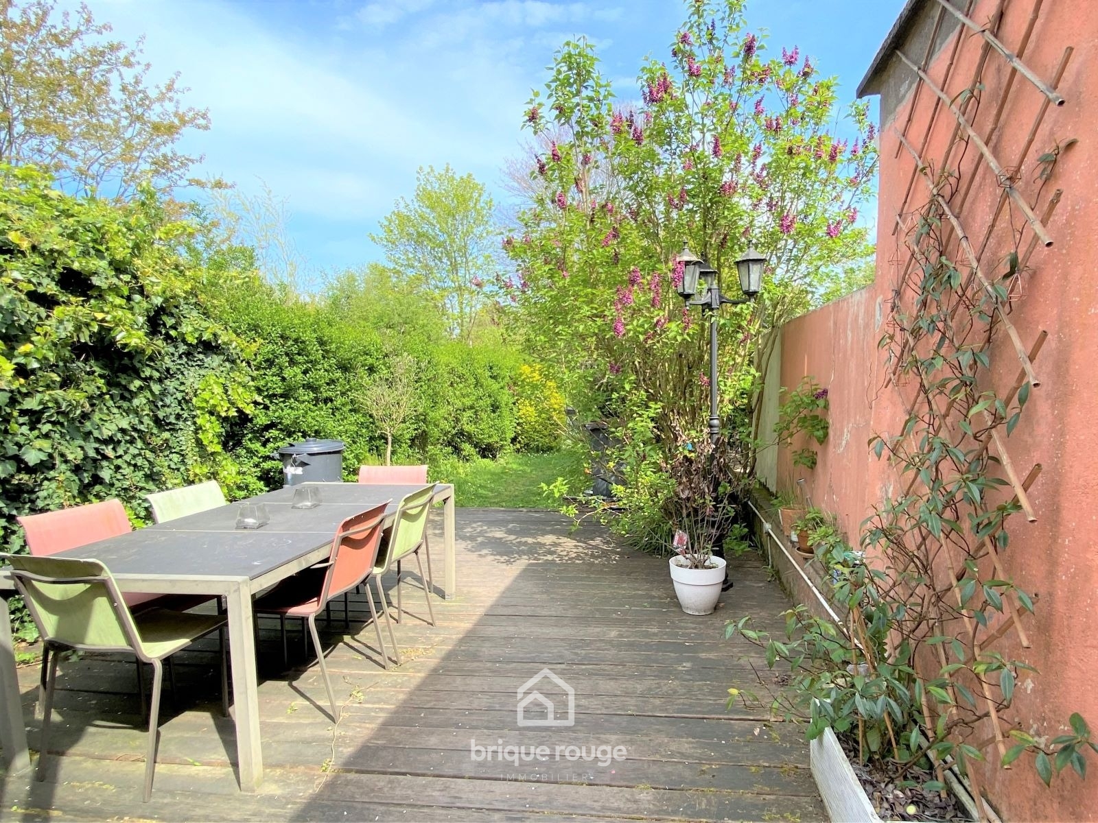 Large maison 1930 au charme preserve proche metro Photo 1 - Brique Rouge Immobilier Large maison 1930 au charme preserve proche metro Photo 1 - Brique Rouge Immobilier