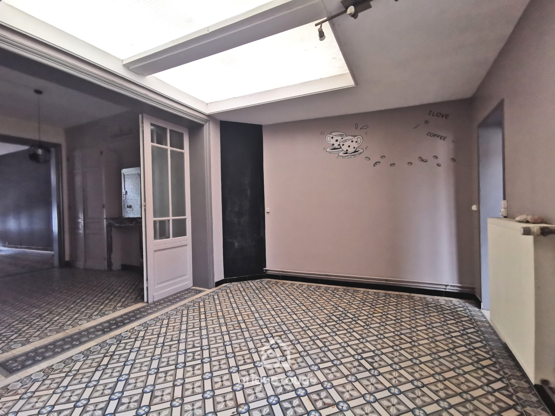 Maison spacieuse en centre ville Photo 1 - Brique Rouge Immobilier Maison spacieuse en centre ville Photo 1 - Brique Rouge Immobilier