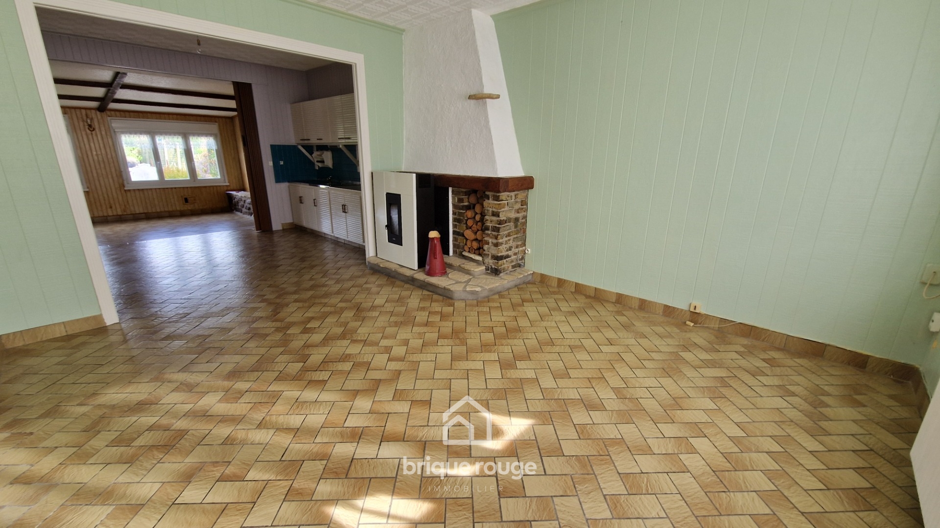 Maison 3 chambres avec jardin et garage Photo 4 - Brique Rouge Immobilier