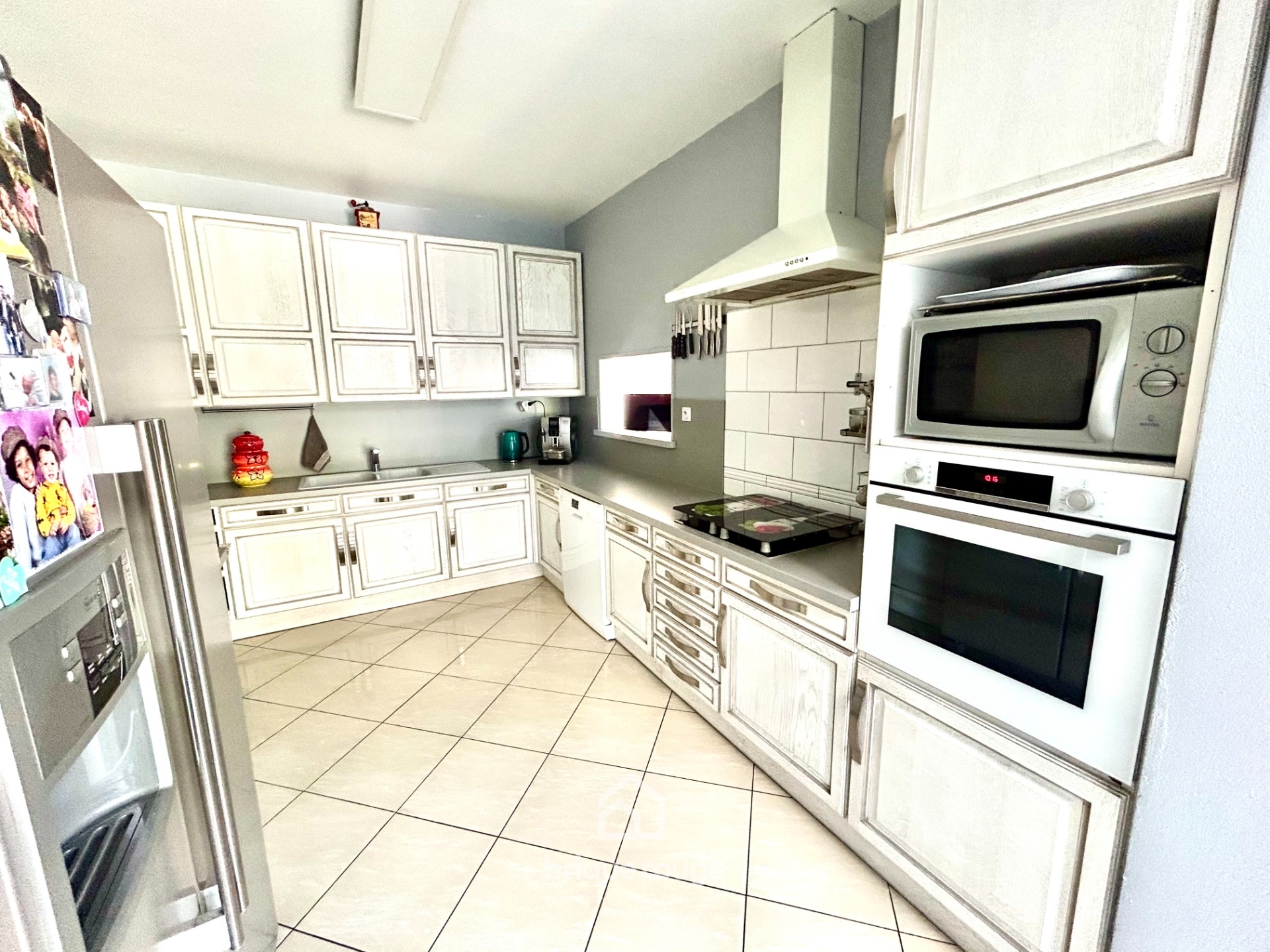 Belle maison familiale de 240 m avec 3 garages  Photo 3 - Brique Rouge Immobilier