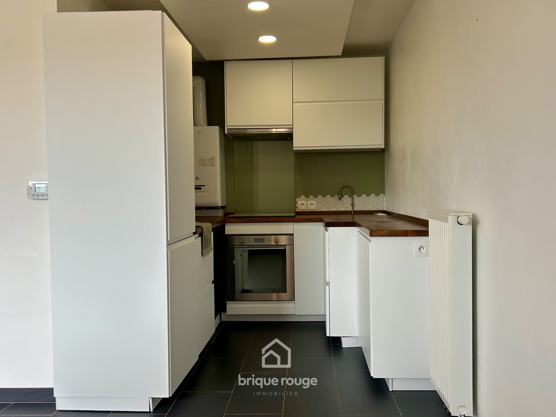 Charmant t2 avec balcon et stationnement Photo 3 - Brique Rouge Immobilier