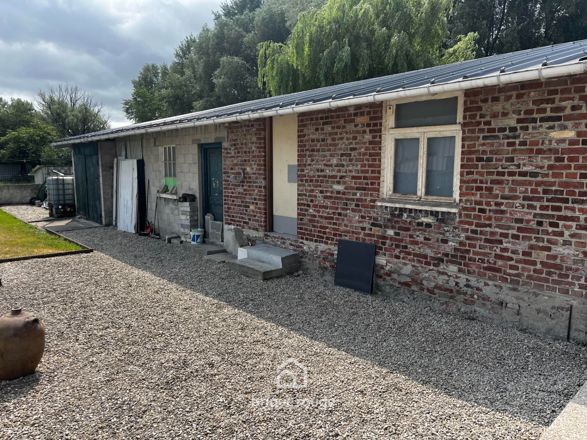 Maison 3 chambres 2 garages grand jardin Photo 3 - Brique Rouge Immobilier