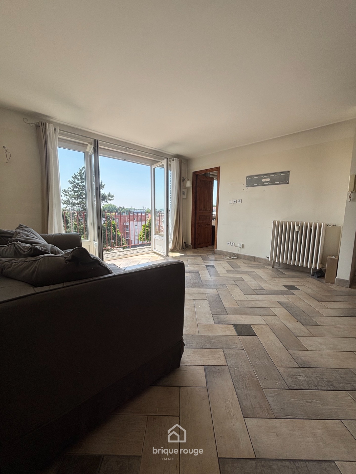 T3 au dernier etage avec balcon garage et metro Photo 1 - Brique Rouge Immobilier T3 au dernier etage avec balcon garage et metro Photo 1 - Brique Rouge Immobilier