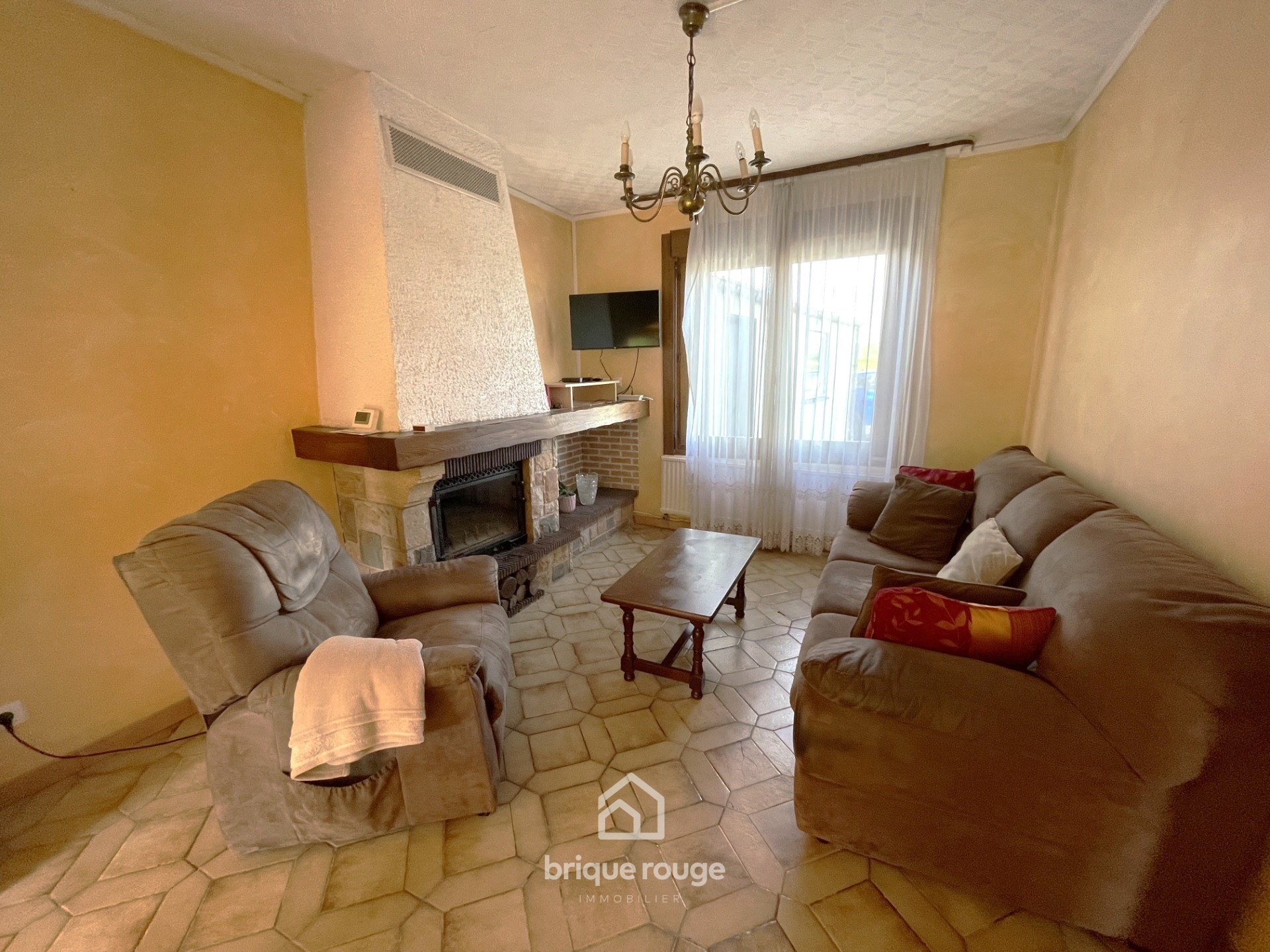 Maison 3 chambres avec jardin Photo 3 - Brique Rouge Immobilier Maison 3 chambres avec jardin Photo 3 - Brique Rouge Immobilier