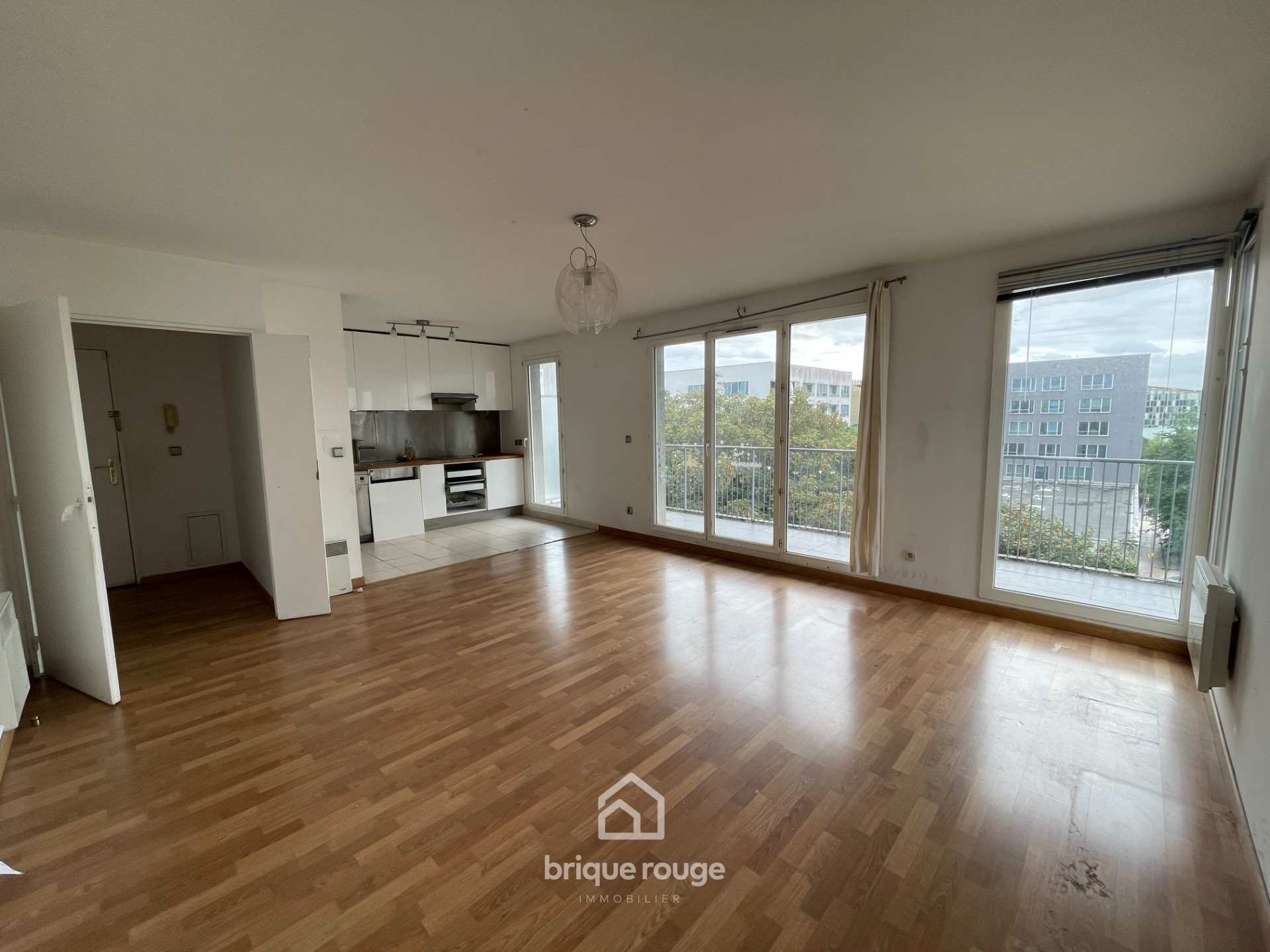 Appartement type 4 de 80 m2 avec parking et cave Photo 1 - Brique Rouge Immobilier