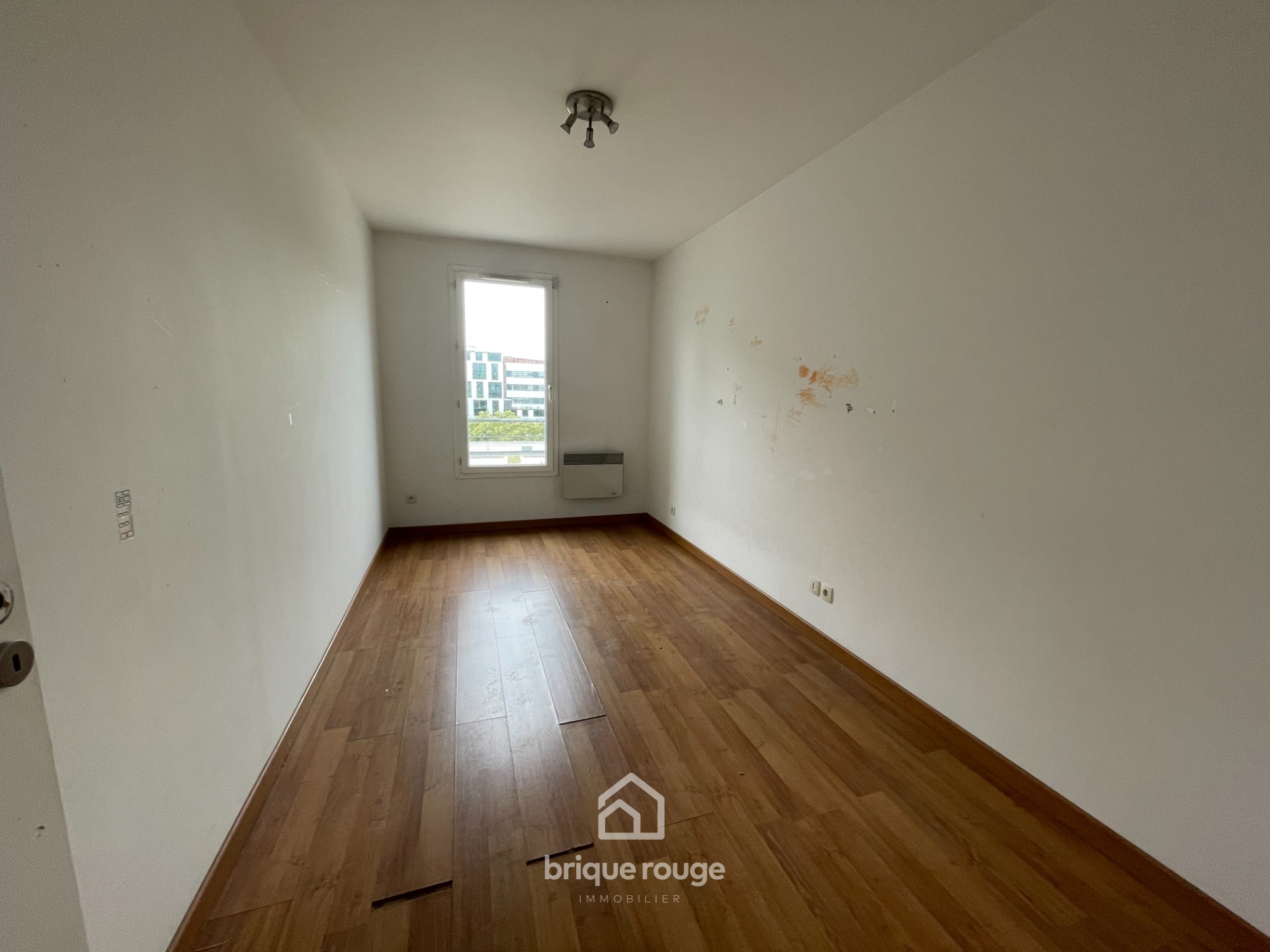 Appartement type 4 de 80 m2 avec parking et cave Photo 2 - Brique Rouge Immobilier