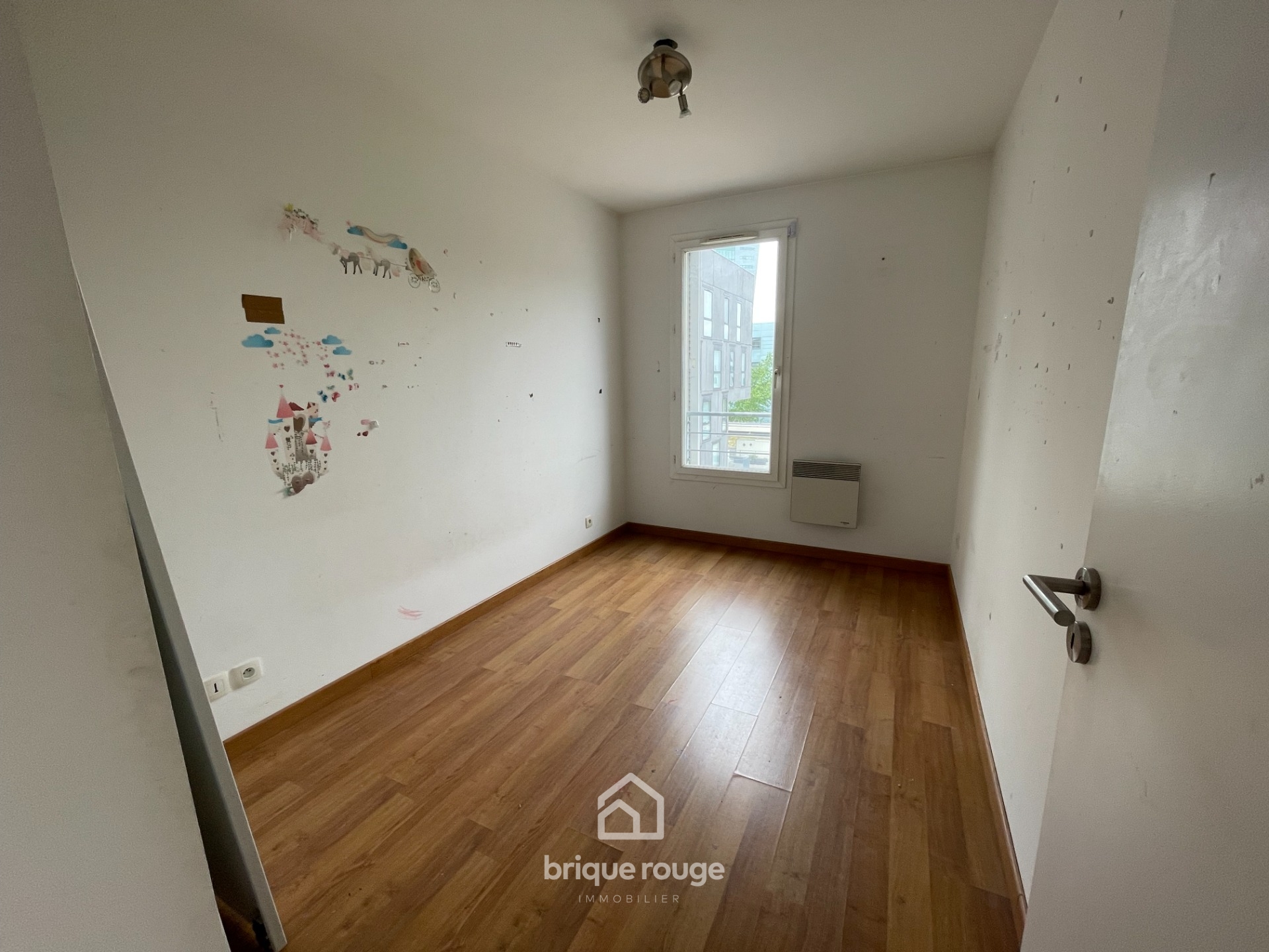 Appartement type 4 de 80 m2 avec parking et cave Photo 3 - Brique Rouge Immobilier