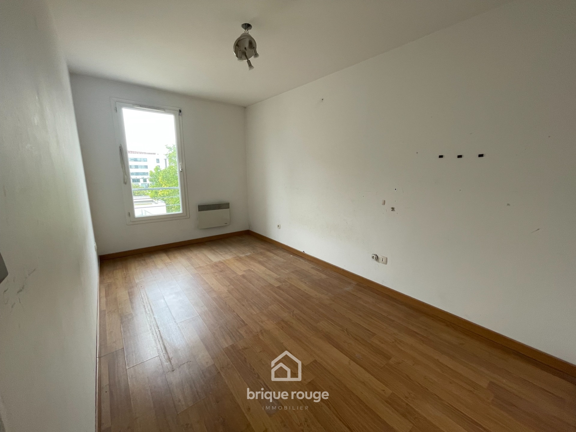 Appartement type 4 de 80 m2 avec parking et cave Photo 4 - Brique Rouge Immobilier