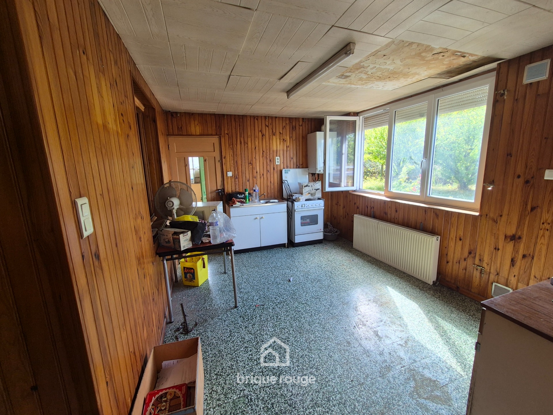 Maison semi individuelle 3 chambres  renover Photo 2 - Brique Rouge Immobilier