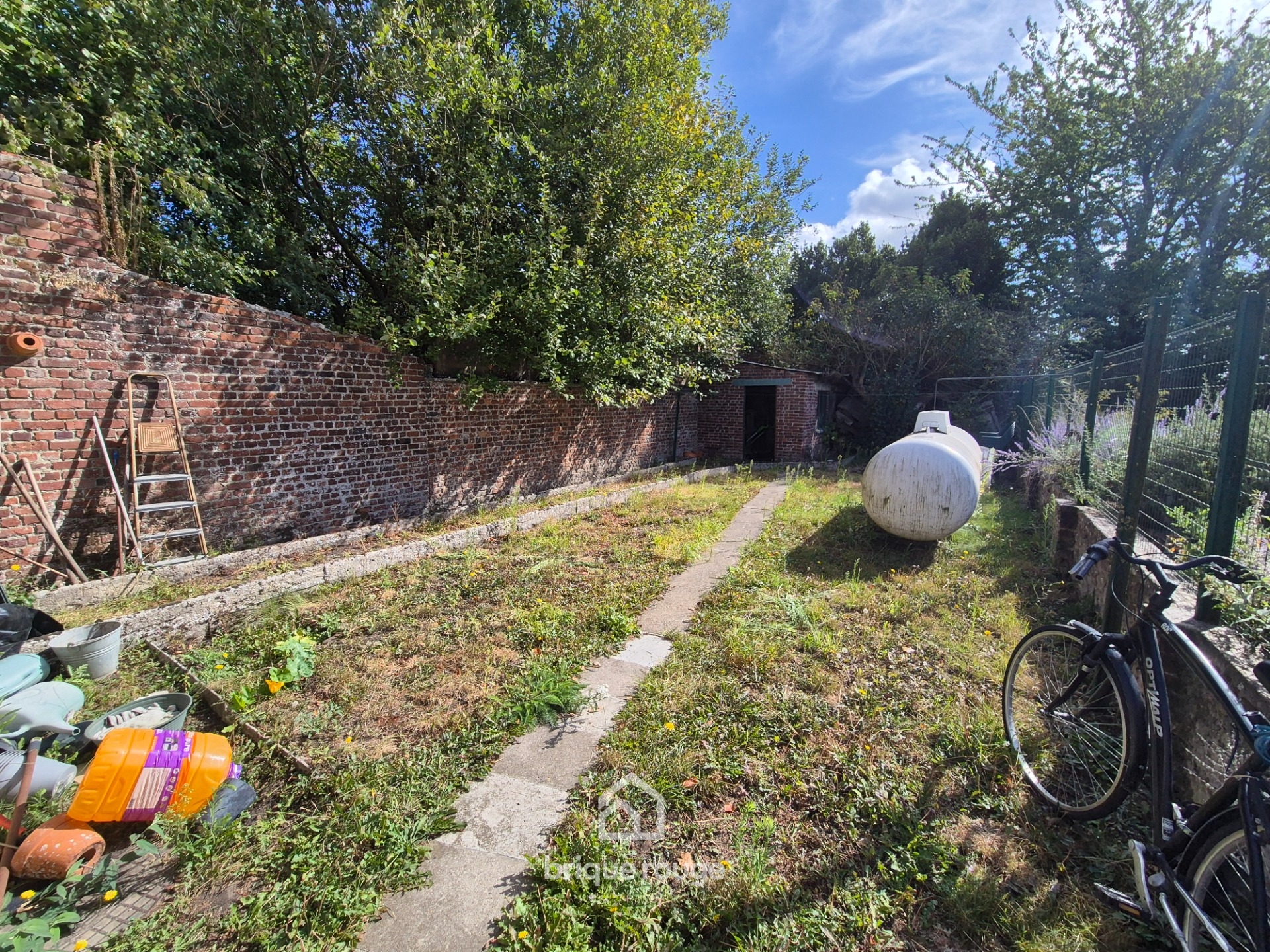 Maison semi individuelle 3 chambres  renover Photo 5 - Brique Rouge Immobilier