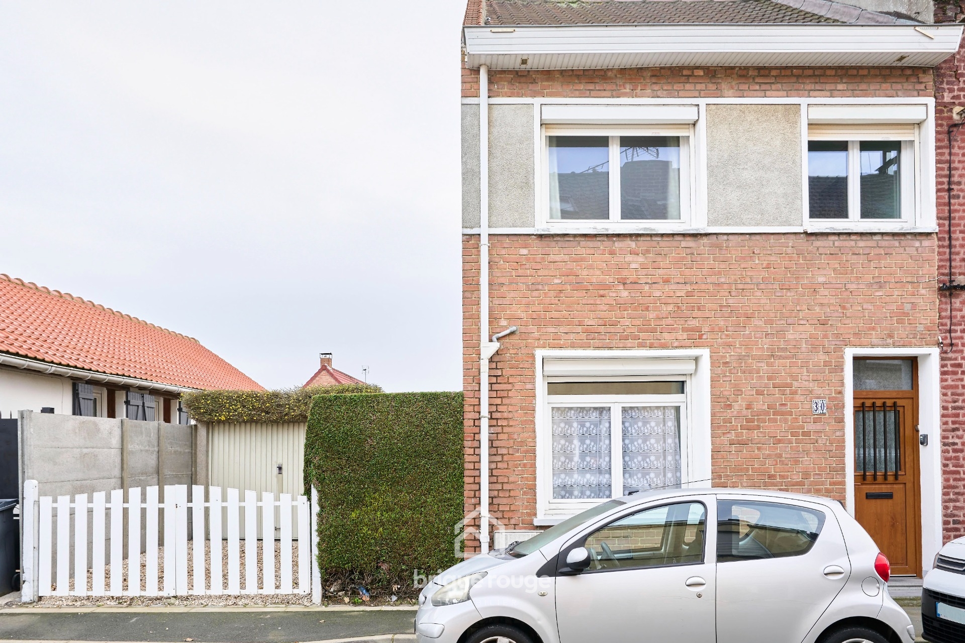 Maison avec garage Photo 1 - Brique Rouge Immobilier