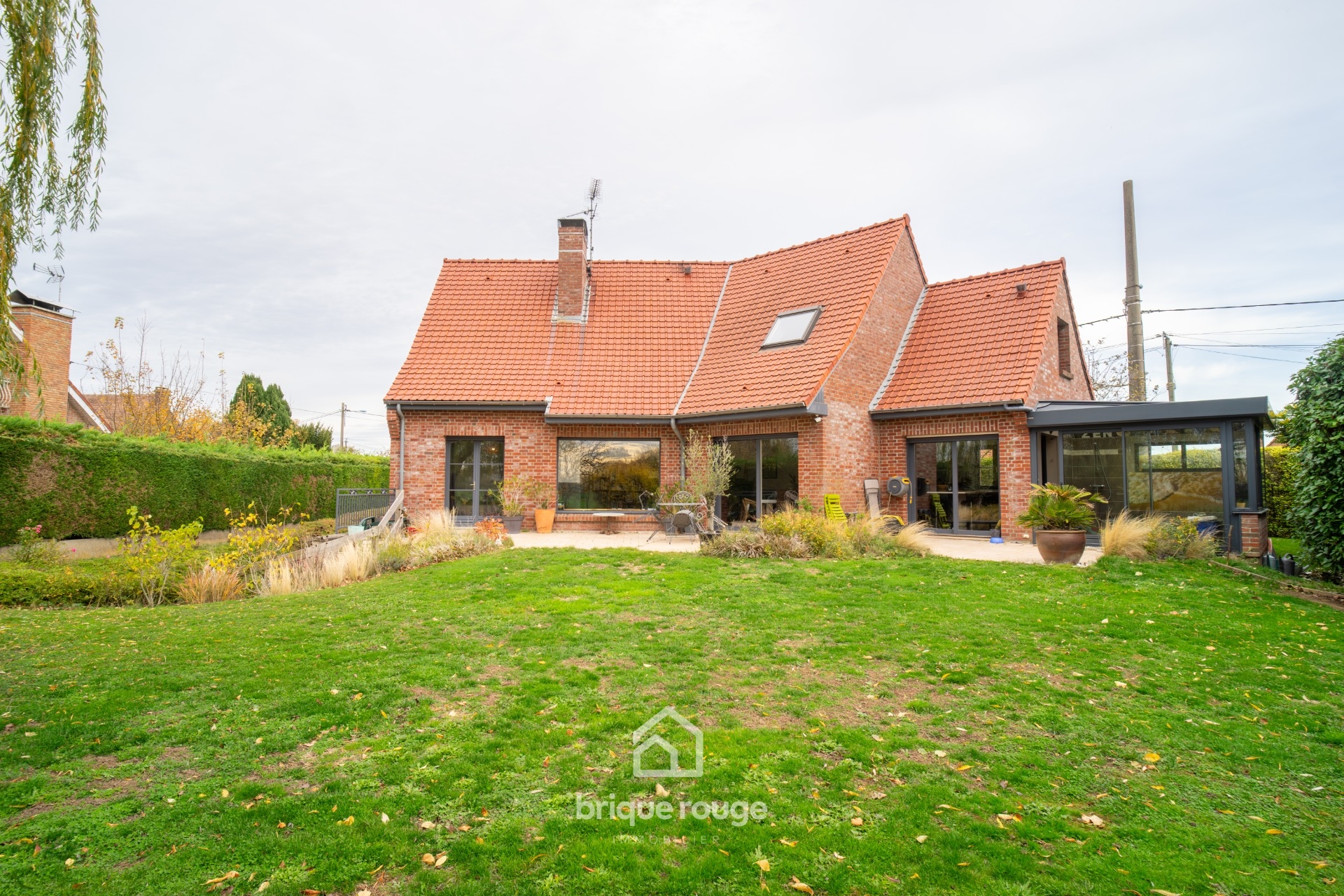 Charmant semi plain pied individuel au coeur du carembault Photo 1 - Brique Rouge Immobilier Charmant semi plain pied individuel au coeur du carembault Photo 1 - Brique Rouge Immobilier