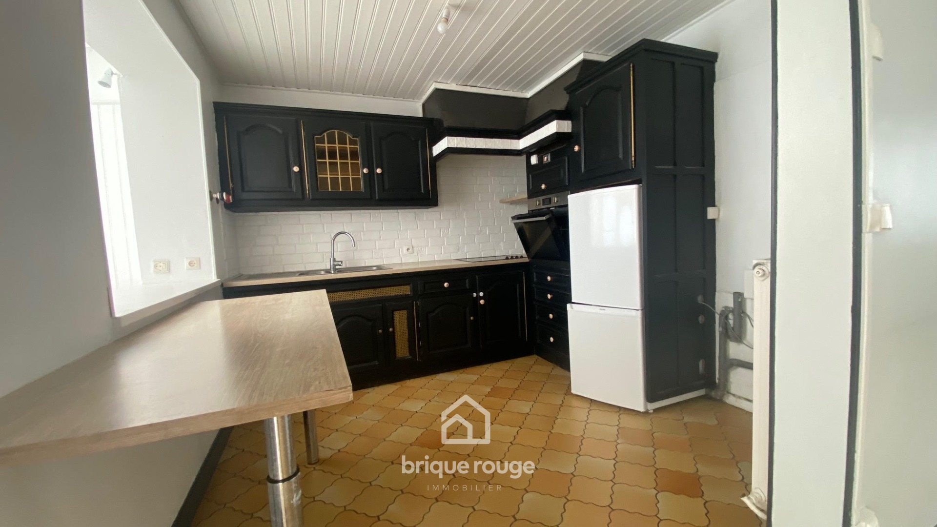 Maison de lotissement   3 chambres jardin Photo 2 - Brique Rouge Immobilier