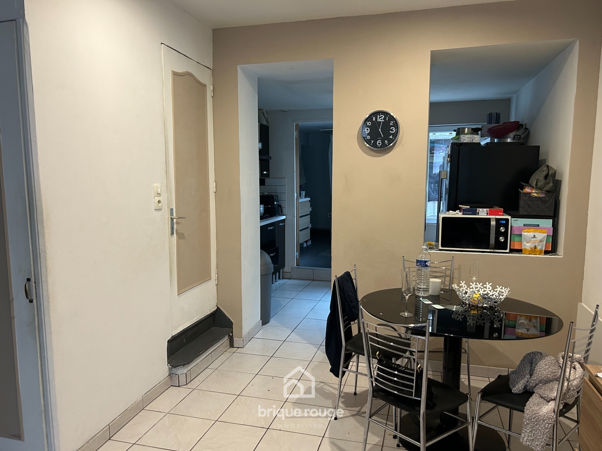 A vendre maison 1930 avec cour  Photo 1 - Brique Rouge Immobilier