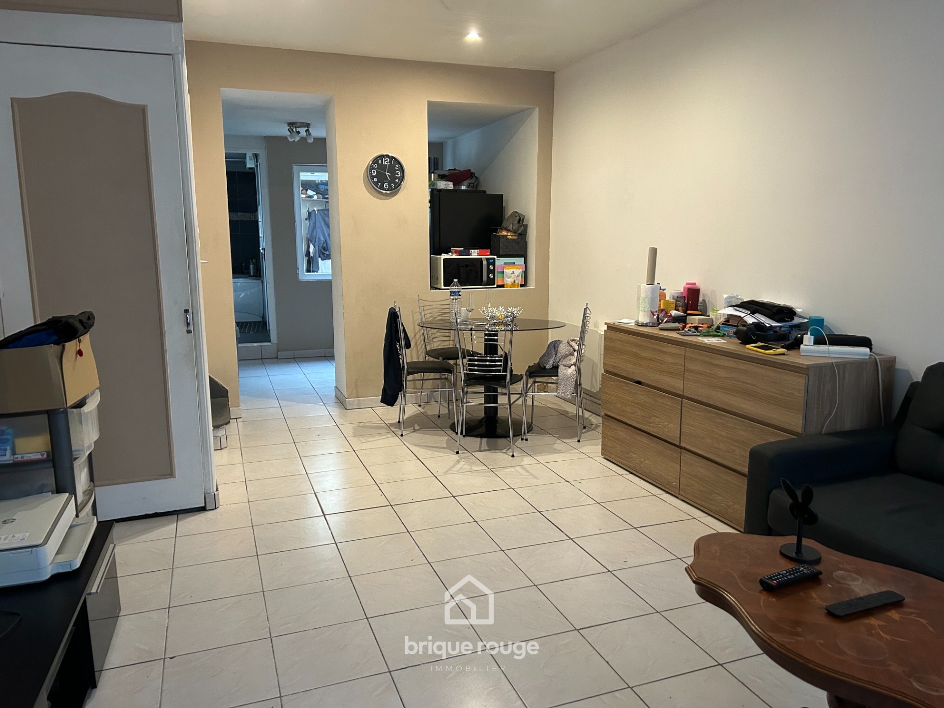 A vendre maison 1930 avec cour  Photo 2 - Brique Rouge Immobilier