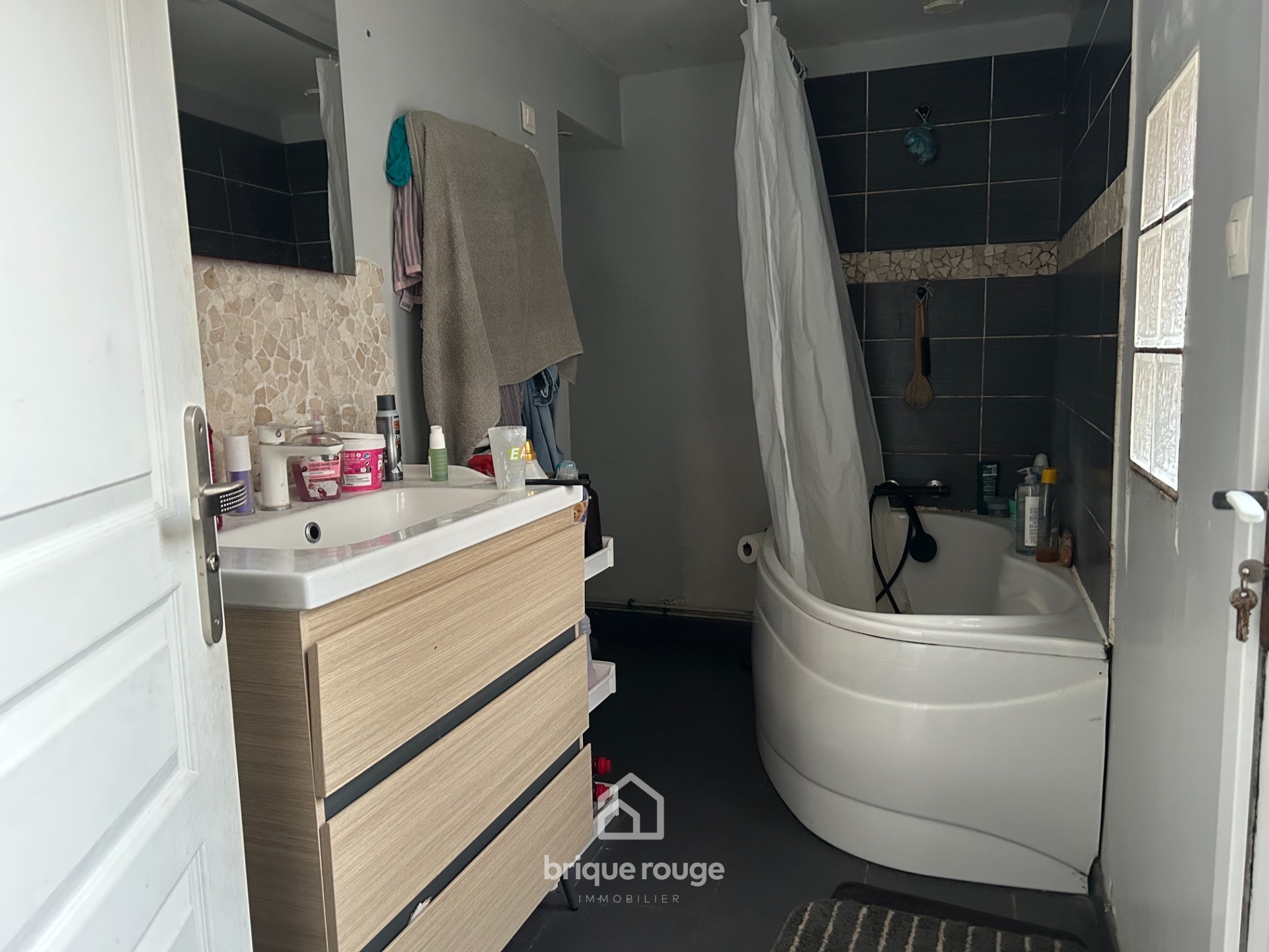 A vendre maison 1930 avec cour  Photo 4 - Brique Rouge Immobilier