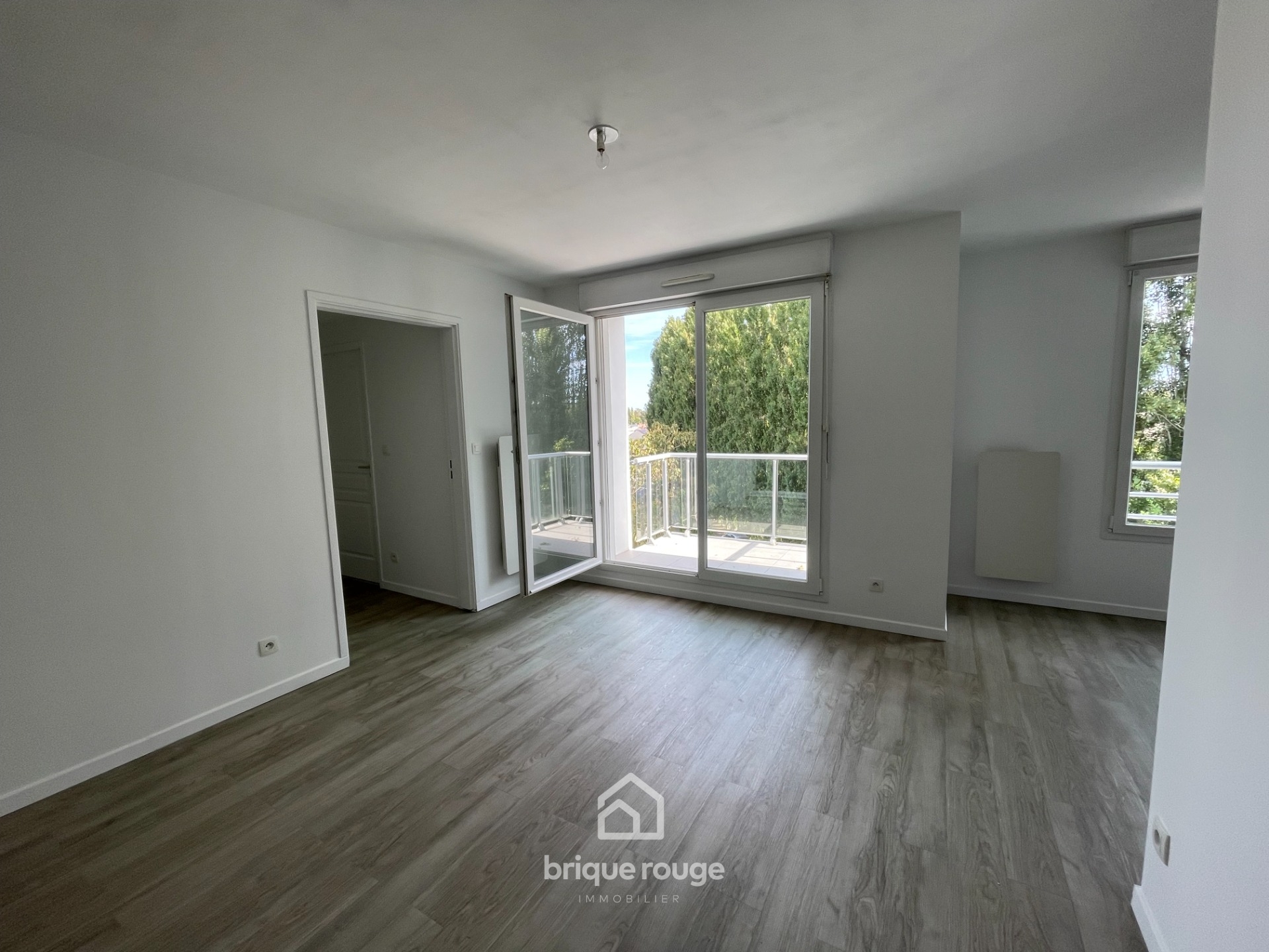 Bel appartement avec terrasse Photo 2 - Brique Rouge Immobilier Bel appartement avec terrasse Photo 2 - Brique Rouge Immobilier