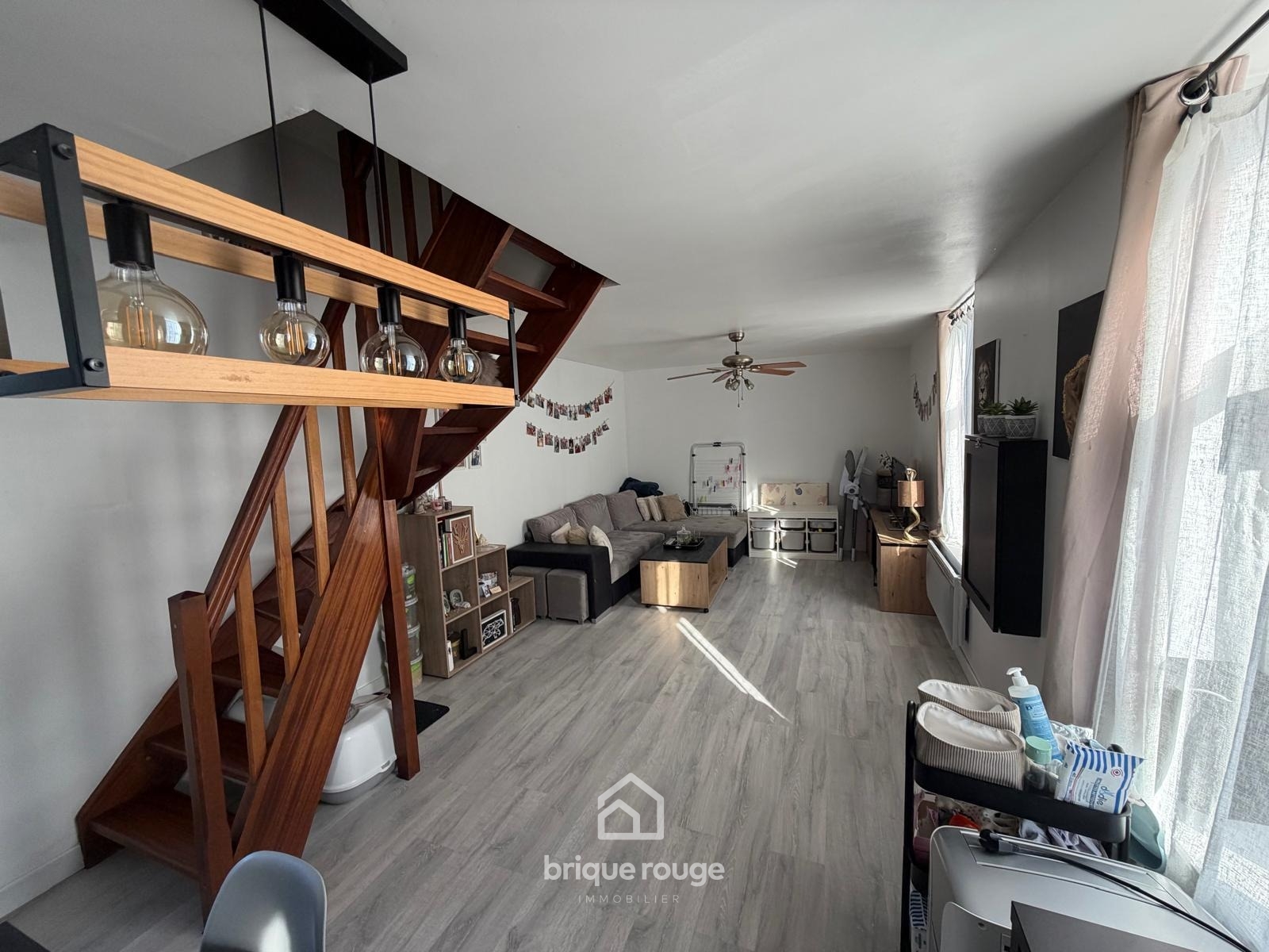 Duplex en parfait etat en centre ville Photo 2 - Brique Rouge Immobilier