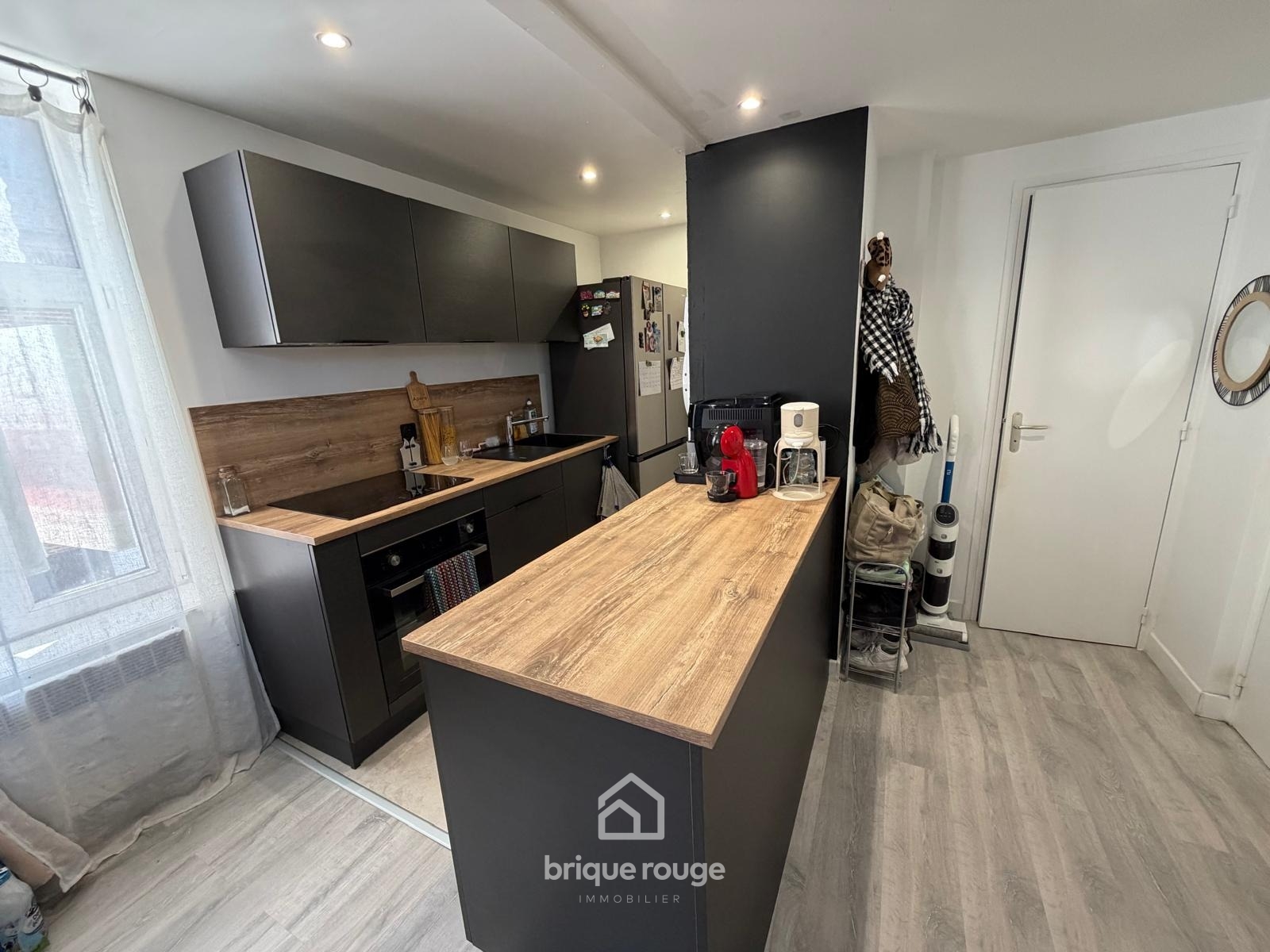 Duplex en parfait etat en centre ville Photo 3 - Brique Rouge Immobilier